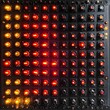 © ruangrit19 - Grid of LED Diodes in Various Illuminated Colors and Patterns