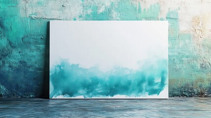 Poster - Elegant white canvas with soft teal strokes against a textured wall in a tranquil art studio space