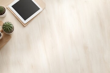 Fototapete - Elegantly arranged workspace features a tablet, a notebook, and a small cactus on a light wood surface, creating a serene and tidy atmosphere for productivity