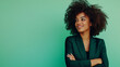 © Diana - Afro business woman looking happy looking at empty space, confident black woman in green suit on a background with copy space