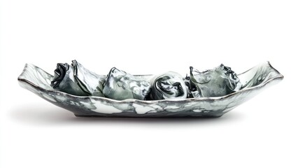 Poster - A decorative dish featuring abstract, sculptural forms resembling crumpled fabric.