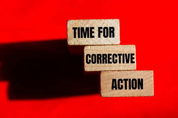 Leinwandbilder - Time for corrective action message written on wooden blocks on red background. Conceptual time for corrective action symbol. Copy space.
