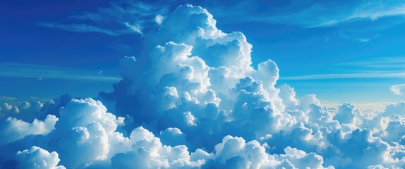 Poster - Serene blue sky with fluffy white clouds creating a beautiful natural texture perfect for backgrounds and atmospheric designs.