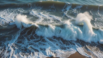 Poster - Aerial View of Turbulent Ocean Waves Crashing on Sandy Beach Shoreline Captured from Above with Dynamic Foam and Sea Spray