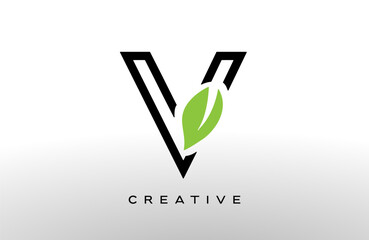 Wall Mural - letter v logo design with green leaf made of black lines vector
