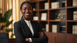 © Kateryna - Confident Black Woman Lawyer in Modern Nigerian Law Office
