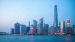 © Kitta Studio - Stunning Skyline View of Modern City at Twilight with Reflection