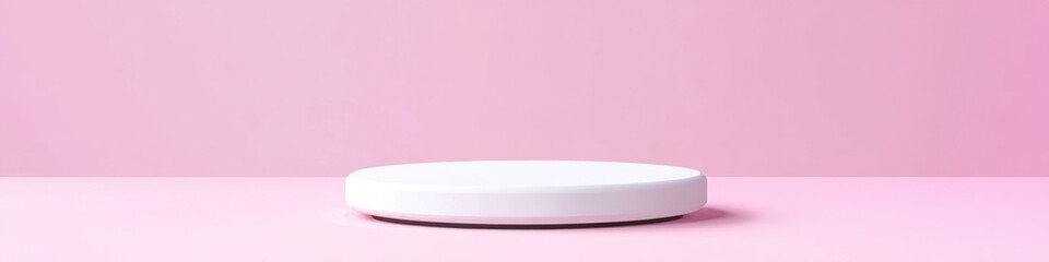 Poster - A single white round object sits on a pink background, perfect for use in designs about simplicity or minimalism