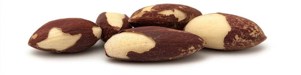 Aufkleber - A collection of nuts scattered on a white surface, perfect for use in food or still life photography