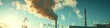 © Ева Поликарпова - A large industrial factory emitting thick smoke into the air, possibly indicating pollution or heavy machinery use