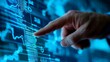 © Wilasini - Close up view of a leader s hand pointing at a teamwork strategy board covered in digital performance metrics and analytics data  Concept of business intelligence financial planning