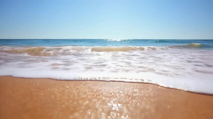 Poster - Gentle waves sparkling with sunlight washing golden sandy shoreline, creating serene tropical seascape embodying peaceful summer vacation atmosphere
