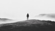 © musa - Solitary figure on misty hilltop, serene landscape background; contemplation, loneliness concept