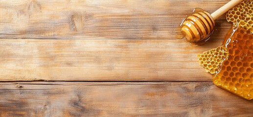 Poster - Golden honey drips from a wooden dipper onto a textured wooden surface. Nearby, a piece of honeycomb rests, glistening under soft light. The scene captures the sweetness and simplicity of nature.