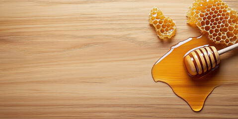 Poster - Golden honey spreads across a wooden surface, creating splashes around a honey dipper. Pieces of honeycomb rest nearby, adding to the rustic beauty of the natural sweetener.