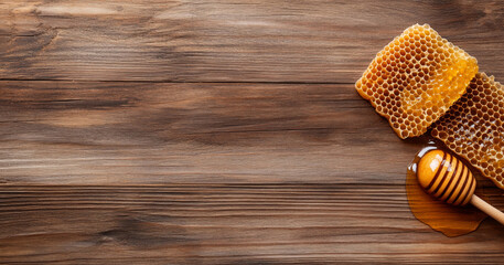 Aufkleber - Golden honeycombs rest beside a wooden honey dipper on a rustic wooden surface. The organic honey glistens, showcasing the art of beekeeping and the sweet rewards of nature.