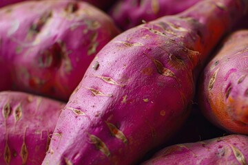 Poster - Close up view of vibrant purple sweet potatoes showcasing their earthy texture, suggesting a recent harvest and healthy eating