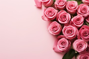 Wall Mural - Beautiful pink roses arranged on a matching pink background, creating a lovely border with empty space for text or design