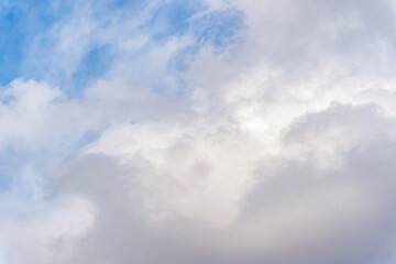 Wall Mural - Blue sky background with storm clouds