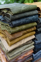 Poster - An abstract arrangement of leather in rich green and gold hues highlights various textures and elegant layers. The composition emphasizes depth and artistic design creating visual intrigue.