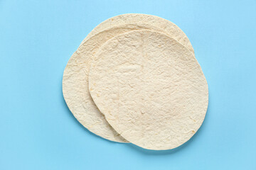 Wall Mural - Thin lavash on blue background