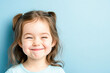 © Kowit - Joyful child smiling indoor setting portrait bright environment close-up