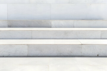 Poster - White Marble Stairs Lead Up to a White Marble Wall, Creating a Clean and Modern Architectural Design.