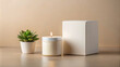 © Mahmud - White Box Mockup with Candle and Plant on Gray Background