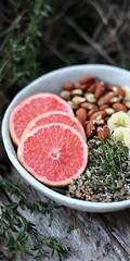 Canvas Print - Healthy breakfast bowl grapefruit, almonds, banana, outdoors