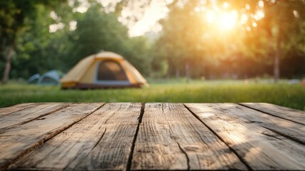 Poster - A serene campsite with a tent and a wooden table in a sunlit forest setting.