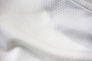 Poster - White fabric sport clothing football jersey with air mesh texture background