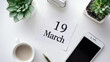 © Nacci - Minimalist Desk Flat Lay with March 19 Calendar