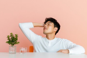 Aufkleber - Mindful Office Break Young Korean Professional in Minimalist Setting with Pastel Colors and Indoor Plant - Enhancing Modern Workplace Wellness and Productivity