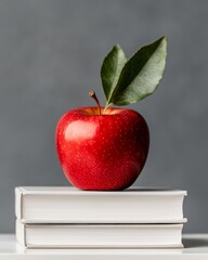 Aufkleber - Minimalist Educational Display Red Apple on Textbooks with Mint Green Backdrop - Academic Branding and Modern Learning Environment Concept