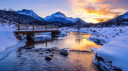 Wall Mural - Scenic winter sunset over mountains, stream, bridge