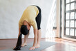 © Charlie's - Female girl Attractive young asian woman doing stretching exercise on mat yoga Calmness and relax at gym Full body concentrated flexibility during workout