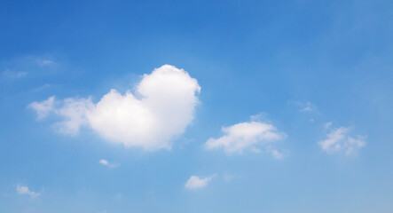 Wall Mural - heart-shaped clouds, sunny day morning in winter, nature landscape daylight on afternoon summer, hor
