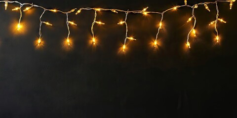 Poster - Warm golden fairy lights shimmering against a dark background, arranged in a cascading pattern across the top of the image for a festive ambiance.