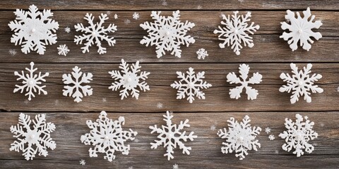 Poster - Snowflakes of various designs scattered on a dark textured wooden surface creating a winter theme with white details and natural contrasts