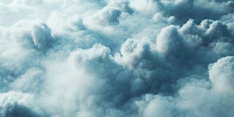 Poster - Soft fluffy clouds in shades of white and light blue create a serene atmosphere, billowing in various formations against a clear sky backdrop.