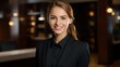 © Darunee - Friendly Hotel Receptionist Welcoming Guests at the Front Desk with a Professional Smile