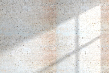 Wall Mural - A concrete textured wall with natural shadows from
sunlight coming through a window that can be used in various designs.