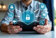 © cookiecutter - The image depicts a person holding a tablet in a modern office setting The tablet screen displays a futuristic interface with a central glowing padlock icon surrounded by various digital symbols