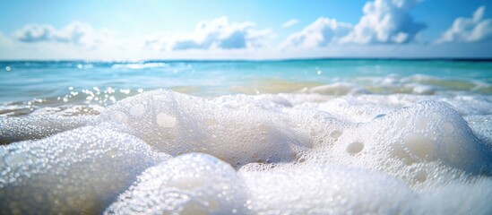 Poster - Sea Foam with Sunlit Waves and Clear Sky on a Summer Day at the Beach