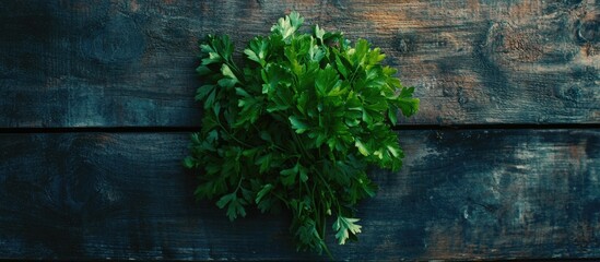 Poster - Fresh parsley displayed on rustic wooden table showcasing vibrant green leaves top view culinary herb concept.
