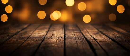 Leinwandbilder - Warm brown wooden surface with bokeh lights in the background ideal for rustic themes and festive decorations
