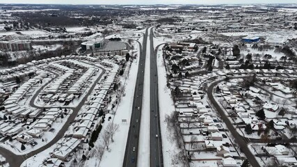 Wall Mural - Breathtaking aerial view of Waterloo, Ontario with 
Interchange highway in a snowy winter