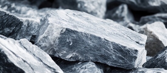 Poster - Gray stone pile macro detail showcasing varying shades and textures for background and wallpaper use.