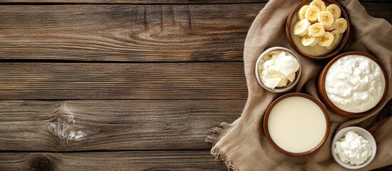 Aufkleber - Fresh dairy products and ripe bananas on rustic wooden backdrop with blank space for creative text or branding design.
