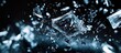 © Pangestu - Shattering glass fragments midair captured in high detail with a black background.